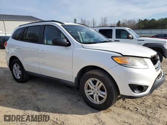 ✅ 2012 Hyundai Santa Fe GLS • VIN: 5XYZG3AB0CG116463 • Lot: 86622674. Listed on Copart with 96,454 mi. Free auction sales archive from the USA and detailed vehicle history report at DreamBid. Image 4.