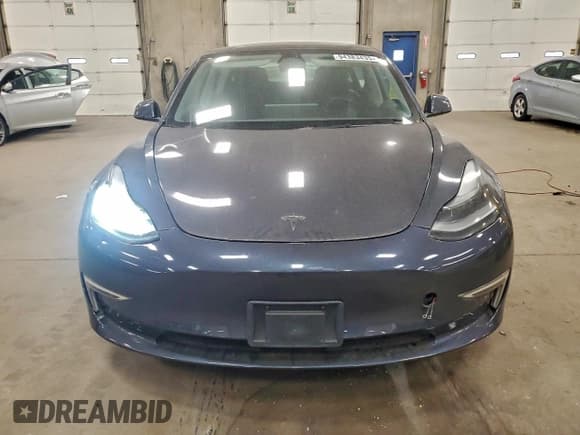 ✅ 2022 Tesla Model 3 Long Range • VIN: 5YJ3E1EB7NF185946 • Лот: 94383435. Опубликован ранее на Copart с пробегом 112 426 миль. Бесплатный доступ к архиву аукционных продаж из США и подробный отчёт об истории автомобиля на DreamBid. Изображение 5.