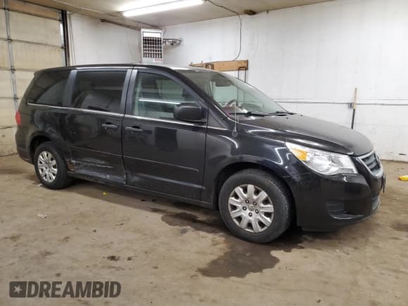 ✅ 2012 Volkswagen Routan S • VIN: 2C4RVAAG8CR393458 • Lot: 84210264. Listed on Copart with 150,995 mi. Free auction sales archive from the USA and detailed vehicle history report at DreamBid. Image 4.