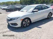 ✅ 2018 Honda Civic EX-T • VIN: 19XFC1E30JE002768 • Lot: 42181905. Listed on IAAI with 23,604 mi. Free auction sales archive from the USA and detailed vehicle history report at DreamBid. Image 17.