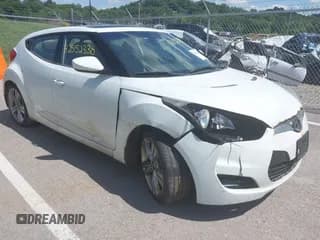 ✅ 2013 Hyundai Veloster w/Gray Int • VIN: KMHTC6AD6DU091813 • Lot: 42552338. Wystawiony na IAAI z przebiegiem 115 755 mil. Bezpłatny archiwum sprzedaży aukcyjnych z USA i szczegółowy raport historii pojazdu na DreamBid. Zdjęcie 1.