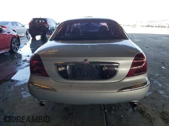 ✅ 2000 Lincoln Continental • VIN: 1LNHM97V9YY885613 • Лот: 86547535. Опубликован ранее на Copart с пробегом 123 289 миль. Бесплатный доступ к архиву аукционных продаж из США и подробный отчёт об истории автомобиля на DreamBid. Изображение 6.