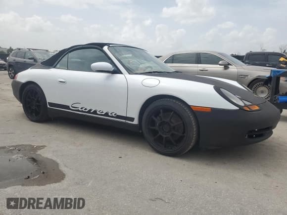 ✅ 1999 Porsche 911 • VIN: WP0CA2993XS651127 • Lot: 59631795. Listed on Copart with 99,103 mi. Free auction sales archive from the USA and detailed vehicle history report at DreamBid. Image 4.