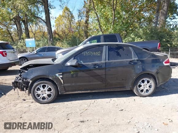✅ 2008 Ford Focus SE • VIN: 1FAHP35N68W256095 • Lot: 43534482. Listed on IAAI with 150,995 mi. Free auction sales archive from the USA and detailed vehicle history report at DreamBid. Image 14.