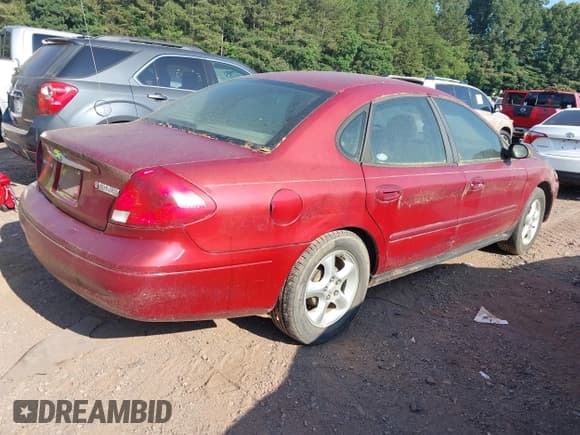 ✅ 2002 Ford Taurus SE Standard • VIN: 1FAFP53U82A118544 • Lot: 42392594. Listed on IAAI with 101,434 mi. Free auction sales archive from the USA and detailed vehicle history report at DreamBid. Image 4.