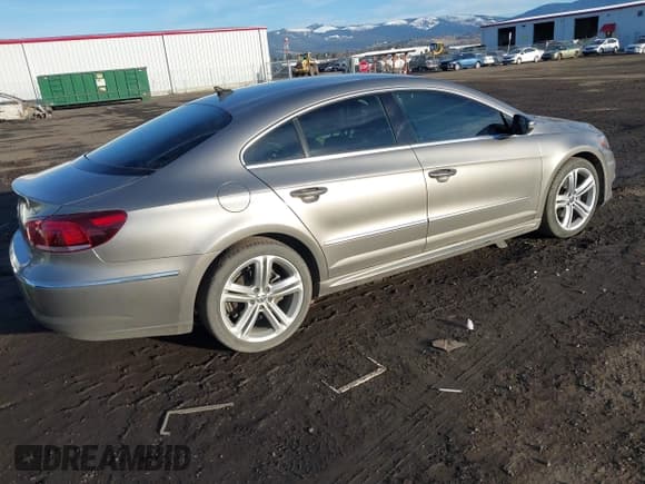 ✅ 2014 Volkswagen CC Sport • VIN: WVWBP7AN1EE527482 • Lot: 41668039. Listed on IAAI with 123,554 mi. Free auction sales archive from the USA and detailed vehicle history report at DreamBid. Image 4.