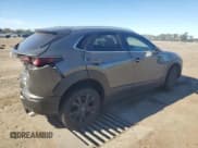 ✅ 2024 Mazda CX-30 S Select Sport • VIN: 3MVDMBBM8RM637180 • Лот: 82603705. Опубликован ранее на Copart с пробегом 10 401 миль. Бесплатный доступ к архиву аукционных продаж из США и подробный отчёт об истории автомобиля на DreamBid. Изображение 3.