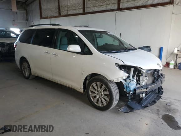 ✅ 2015 Toyota Sienna XLE • VIN: 5TDDK3DC7FS096748 • Lot: 86982005. Listed on Copart with 197,987 mi. Free auction sales archive from the USA and detailed vehicle history report at DreamBid. Image 4.