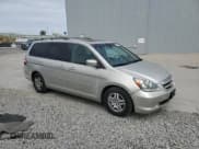 ✅ 2006 Honda Odyssey EX-L • VIN: 5FNRL38656B410666 • Лот: 80554015. Опубликован ранее на Copart с пробегом 243 001 миль. Бесплатный доступ к архиву аукционных продаж из США и подробный отчёт об истории автомобиля на DreamBid. Изображение 4.
