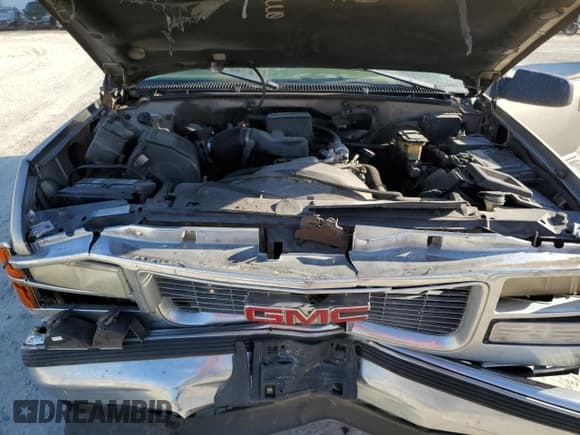 ✅ 1999 GMC Yukon • VIN: 1GKEC13R8XJ750848 • Lot: 58197545. Listed on Copart with 319,551 mi. Free auction sales archive from the USA and detailed vehicle history report at DreamBid. Image 12.