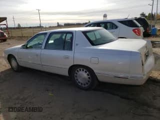 ✅ 1997 Cadillac DeVille • VIN: 1G6KD54Y7VU295935 • Lot: 75686244. Listed on Copart with 72,813 mi. Free auction sales archive from the USA and detailed vehicle history report at DreamBid. Image 2.