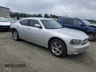 2010 Dodge Charger SXT with VIN 2B3CA3CV5AH146914, listed as a Copart auction lot 72917494 with 103,931 mi miles and Salvage title. Bid and sale history available at DreamBid. Image 4.