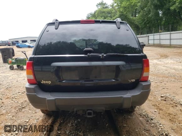 ✅ 2004 Jeep Grand Cherokee Laredo • VIN: 1J4GX48N04C403878 • Lot: 59225685. Listed on Copart with 258,108 mi. Free auction sales archive from the USA and detailed vehicle history report at DreamBid. Image 6.