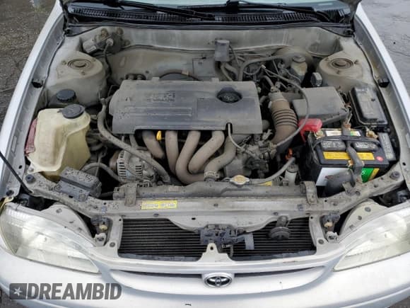 ✅ 2000 Toyota Corolla VE • VIN: 1NXBR12E1YZ414448 • Лот: 82390975. Опубликован ранее на Copart с пробегом 106 255 миль. Бесплатный доступ к архиву аукционных продаж из США и подробный отчёт об истории автомобиля на DreamBid. Изображение 11.