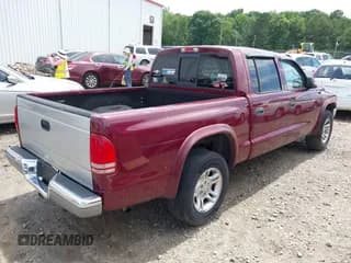 ✅ 2003 Dodge Dakota SLT • VIN: 1D7HL48N63S281141 • Lot: 42456145. Wystawiony na IAAI z przebiegiem 202 935 mil. Bezpłatny archiwum sprzedaży aukcyjnych z USA i szczegółowy raport historii pojazdu na DreamBid. Zdjęcie 4.