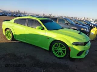 ✅ 2023 Dodge Charger Scat Pack • VIN: 2C3CDXGJ6PH547261 • Lot: 43666258. Listed on IAAI with 7,047 mi. Free auction sales archive from the USA and detailed vehicle history report at DreamBid. Image 1.