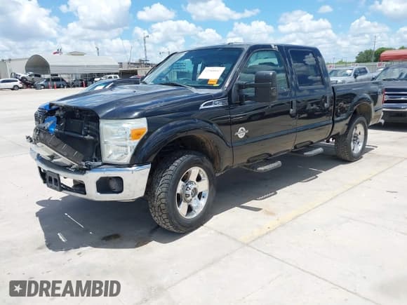 ✅ 2015 Ford F-250 Lariat • VIN: 1FT7W2BT6FEC12011 • Lot: 42588847. Listed on IAAI with 310,355 mi. Free auction sales archive from the USA and detailed vehicle history report at DreamBid. Image 2.