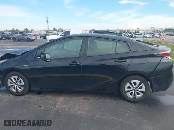 ✅ 2017 Toyota Prius Three • VIN: JTDKARFUXH3532550 • Lot: 43277514. Wystawiony na IAAI z przebiegiem 114 312 mil. Bezpłatny archiwum sprzedaży aukcyjnych z USA i szczegółowy raport historii pojazdu na DreamBid. Zdjęcie 14.