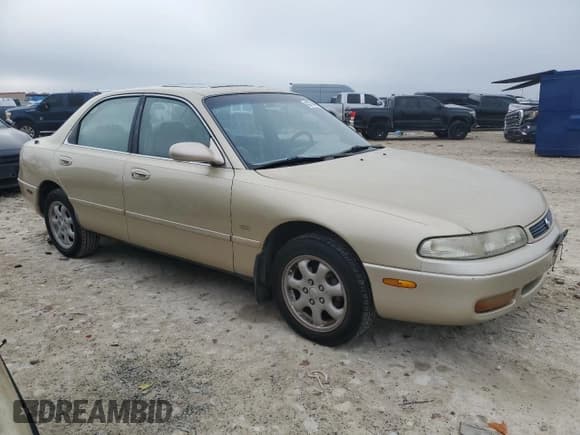 ✅ 1995 Mazda 626 • VIN: 1YVGE22D0S5352815 • Lot: 43770435. Listed on Copart with 112,171 mi. Free auction sales archive from the USA and detailed vehicle history report at DreamBid. Image 4.