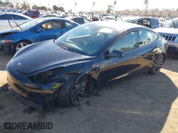 ✅ 2021 Tesla Model 3 Performance • VIN: 5YJ3E1EC6MF999321 • Lot: 41417451. Wystawiony na IAAI z przebiegiem 20 562 mil. Bezpłatny archiwum sprzedaży aukcyjnych z USA i szczegółowy raport historii pojazdu na DreamBid. Zdjęcie 2.