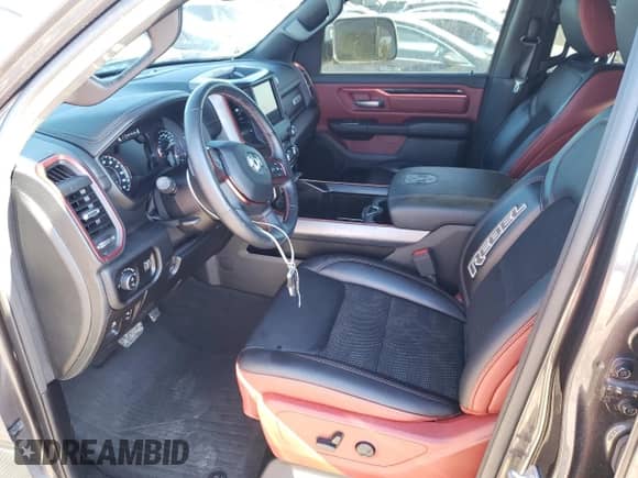 2020 Ram 1500 Rebel z VIN 1C6RRELT9LN303468, wystawiony jako Copart lot #71399722 z przebiegiem 18 822 mil mil oraz . Historia ofert i sprzedaży dostępna na DreamBid. Obrazek 5.