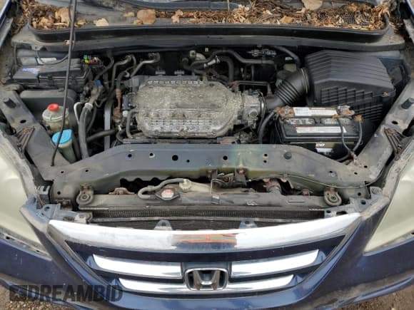 ✅ 2006 Honda Odyssey EX-L • VIN: 5FNRL38796B079454 • Lot: 92608495. Listed on Copart with Not provided. Free auction sales archive from the USA and detailed vehicle history report at DreamBid. Image 12.