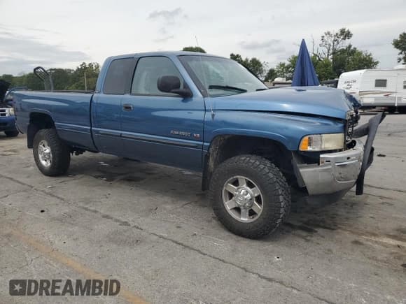 ✅ 2002 Dodge 2500 • VIN: 3B7KF23Z22M304234 • Lot: 70208915. Listed on Copart with 132,334 mi. Free auction sales archive from the USA and detailed vehicle history report at DreamBid. Image 4.
