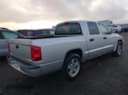 ✅ 2005 Dodge Dakota ST • VIN: 1D7HW28N65S130251 • Лот: 43622144. Опубликован ранее на IAAI с пробегом 205 489 миль. Бесплатный доступ к архиву аукционных продаж из США и подробный отчёт об истории автомобиля на DreamBid. Изображение 4.