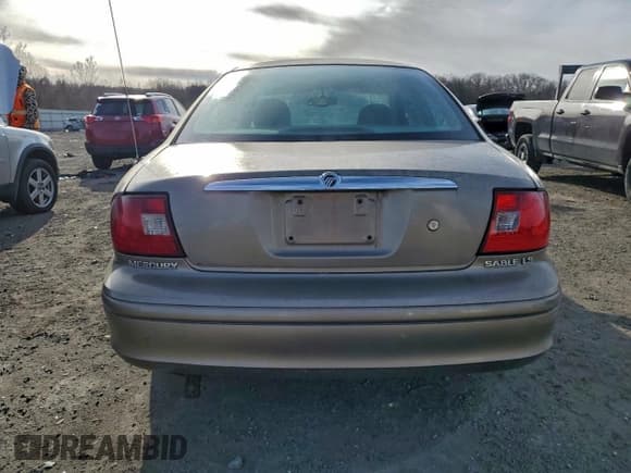 ✅ 2003 Mercury Sable LS Premium • VIN: 1MEFM55SX3G626381 • Lot: 94824895. Listed on Copart with 105,484 mi. Free auction sales archive from the USA and detailed vehicle history report at DreamBid. Image 6.