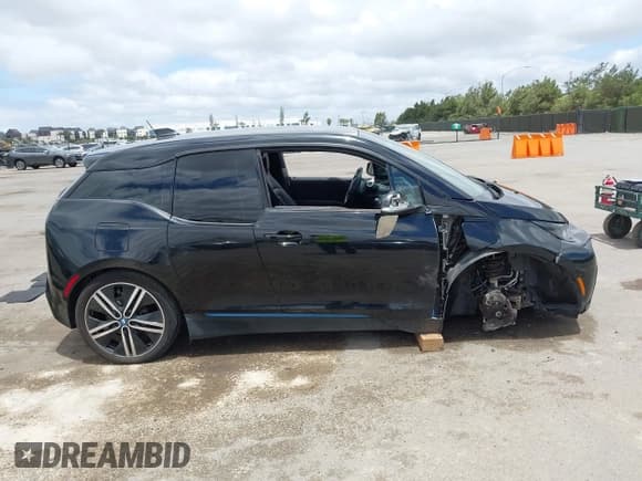 ✅ 2017 BMW i3 • VIN: WBY1Z8C5XHV889564 • Лот: 42239516. Опубликован ранее на IAAI с пробегом 54 400 миль. Бесплатный доступ к архиву аукционных продаж из США и подробный отчёт об истории автомобиля на DreamBid. Изображение 14.