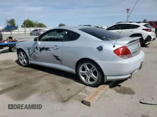 2005 Hyundai Tiburon GT с VIN KMHHN65F05U169144, выставлен на аукционе Copart как лот 67944695 с пробегом 139 483 миль миль и Списание • Salvage title. История ставок и продаж доступна на DreamBid. Изображение 2.