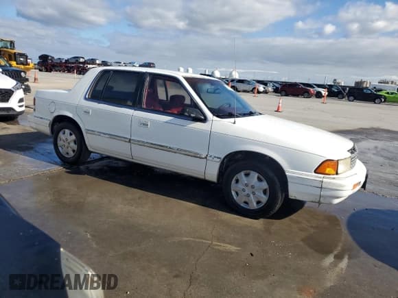 ✅ 1994 Plymouth Acclaim • VIN: 3P3AA4630RT275149 • Lot: 79877324. Wystawiony na Copart z przebiegiem 125 175 mil. Bezpłatny archiwum sprzedaży aukcyjnych z USA i szczegółowy raport historii pojazdu na DreamBid. Zdjęcie 4.