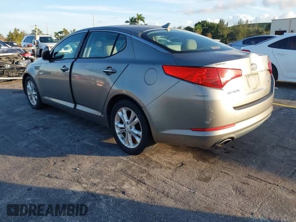 ✅ 2012 Kia Optima EX • VIN: 5XXGN4A7XCG010038 • Lot: 43835794. Listed on IAAI with 54,734 mi. Free auction sales archive from the USA and detailed vehicle history report at DreamBid. Image 3.