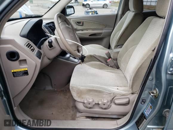 2005 Hyundai Tucson GLS z VIN KM8JN72D75U142775, wystawiony jako Copart lot #53075834 z przebiegiem 174 100 mil mil oraz Szkoda całkowita • Salvage title. Historia ofert i sprzedaży dostępna na DreamBid. Obrazek 7.