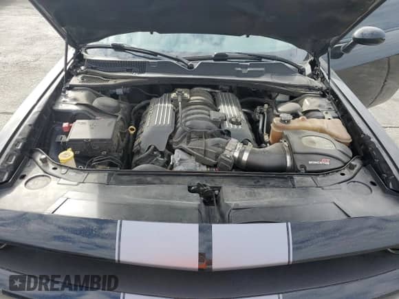 2016 Dodge Challenger SRT 392 с VIN 2C3CDZDJXGH331929, выставлен на аукционе Copart как лот 81610275 с пробегом 64 882 миль миль и Списание • Salvage title. История ставок и продаж доступна на DreamBid. Изображение 11.