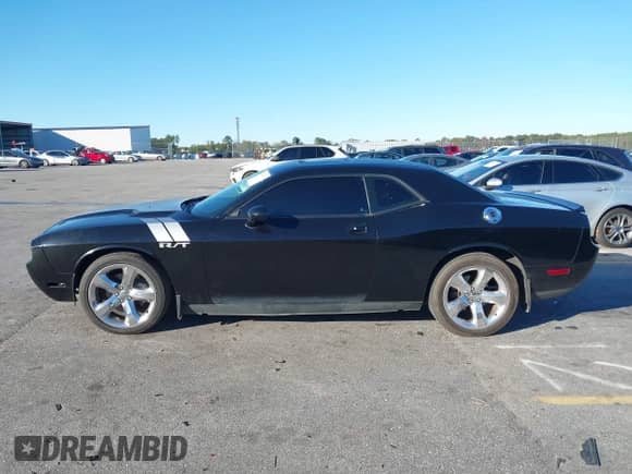 2012 Dodge Challenger R/T Plus with VIN 2C3CDYBT9CH275359, listed as a IAAI auction lot 43595746 with 182,928 mi miles and . Bid and sale history available at DreamBid. Image 14.