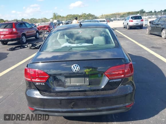 ✅ 2014 Volkswagen Jetta Hybrid • VIN: 3VW637AJ3EM219456 • Lot: 43745704. Listed on IAAI with 105,295 mi. Free auction sales archive from the USA and detailed vehicle history report at DreamBid. Image 16.