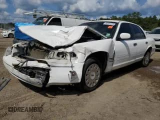 ✅ 2003 Ford Crown Victoria Standard • VIN: 2FAFP73W83X116900 • Lot: 85554325. Listed on Copart with 166,216 mi. Free auction sales archive from the USA and detailed vehicle history report at DreamBid. Image 1.