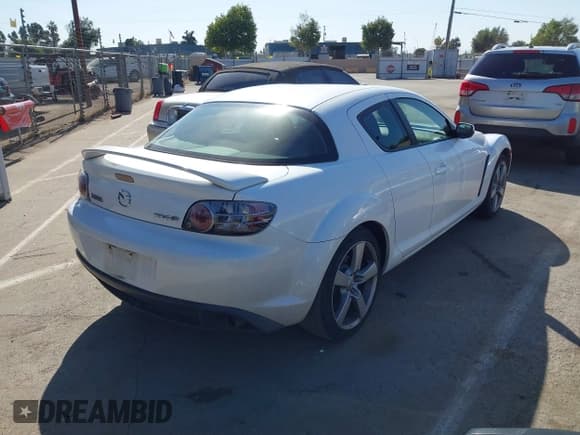 ✅ 2005 Mazda RX-8 • VIN: JM1FE173650158304 • Lot: 42531260. Listed on IAAI with 106,338 mi. Free auction sales archive from the USA and detailed vehicle history report at DreamBid. Image 4.
