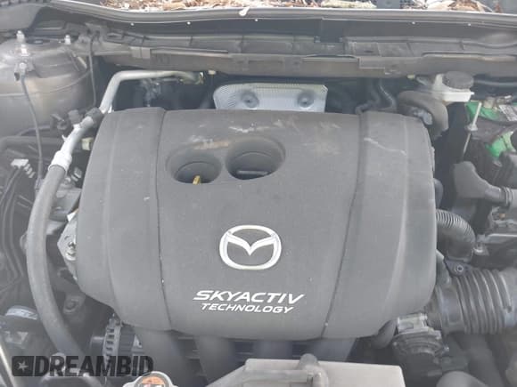 ✅ 2016 Mazda CX-5 Grand Touring • VIN: JM3KE2DY7G0782899 • Lot: 42949510. Wystawiony na IAAI z przebiegiem 85 502 mil. Bezpłatny archiwum sprzedaży aukcyjnych z USA i szczegółowy raport historii pojazdu na DreamBid. Zdjęcie 10.