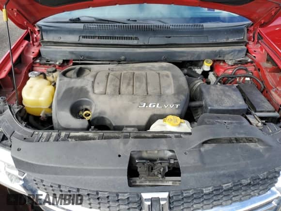 2012 Dodge Journey SXT с VIN 3C4PDCCG6CT251805, выставлен на аукционе Copart как лот 70626415 с пробегом 205 172 миль миль и Списание • Salvage title. История ставок и продаж доступна на DreamBid. Изображение 12.