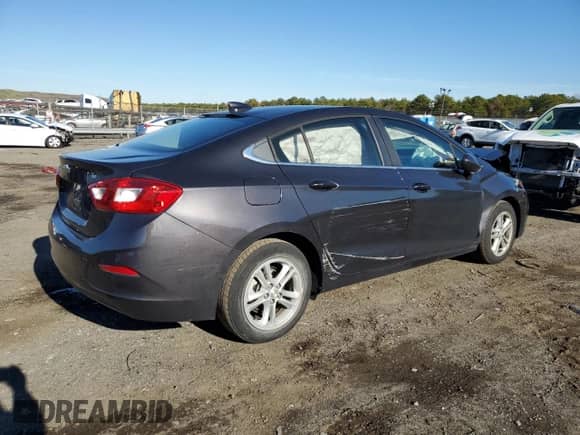 2017 Chevrolet Cruze LT z VIN 1G1BE5SM9H7234737, wystawiony jako Copart lot #69469422 z przebiegiem 41 545 mil mil oraz . Historia ofert i sprzedaży dostępna na DreamBid. Obrazek 3.