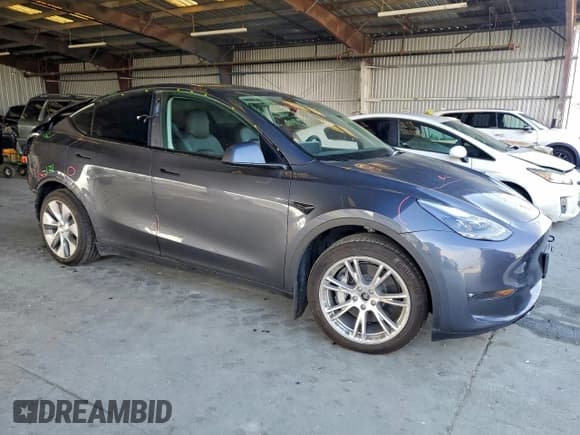 ✅ 2023 Tesla Model Y Long Range • VIN: 7SAYGAEE0PF911100 • Lot: 94993705. Wystawiony na Copart z przebiegiem 24 976 mil. Bezpłatny archiwum sprzedaży aukcyjnych z USA i szczegółowy raport historii pojazdu na DreamBid. Zdjęcie 4.
