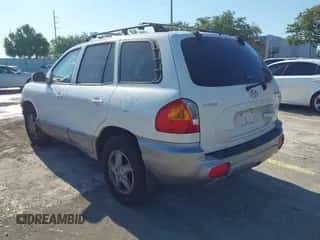 ✅ 2004 Hyundai Santa Fe GLS • VIN: KM8SC73D74U675555 • Лот: 42021978. Размещён на IAAI с пробегом 198 778 миль миль. Получите бесплатный доступ к архиву аукционных продаж из США и посмотрите подробный отчёт об истории автомобиля на DreamBid. Изображение 3.