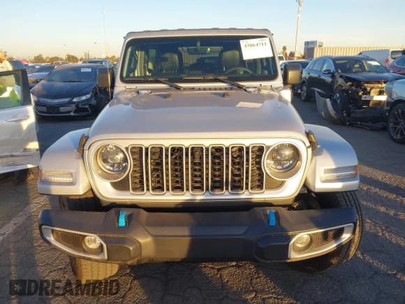 ✅ 2023 Jeep Wrangler Sahara • VIN: 1C4JJXP65PW630477 • Lot: 43864711. Listed on IAAI with 10,033 mi. Free auction sales archive from the USA and detailed vehicle history report at DreamBid. Image 12.