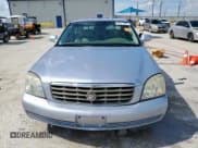 ✅ 2004 Cadillac DeVille DHS • VIN: 1G6KE54Y74U220213 • Lot: 64277385. Listed on Copart with 142,344 mi. Free auction sales archive from the USA and detailed vehicle history report at DreamBid. Image 5.