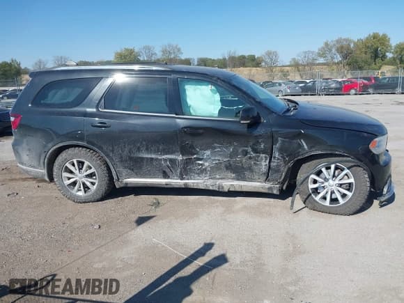 ✅ 2016 Dodge Durango Limited • VIN: 1C4RDJDG6GC477081 • Lot: 43414662. Listed on IAAI with 134,313 mi. Free auction sales archive from the USA and detailed vehicle history report at DreamBid. Image 13.