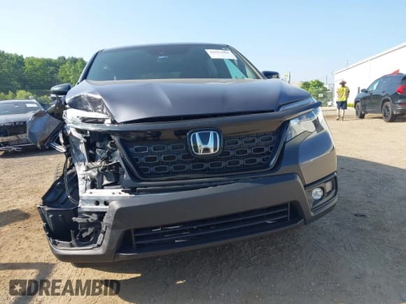 ✅ 2021 Honda Passport EX-L • VIN: 5FNYF8H51MB027490 • Lot: 42527501. Listed on IAAI with 85,635 mi. Free auction sales archive from the USA and detailed vehicle history report at DreamBid. Image 12.