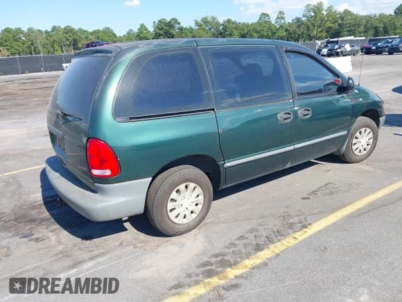 ✅ 1999 Plymouth Voyager • VIN: 2P4FP2536XR443320 • Lot: 43102161. Listed on IAAI with 156,591 mi. Free auction sales archive from the USA and detailed vehicle history report at DreamBid. Image 4.