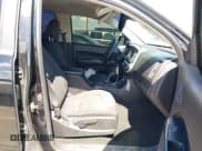 ✅ 2016 GMC Canyon 2WD SLE • VIN: 1GTG5CE3XG1160847 • Lot: 43287308. Listed on IAAI with 141,323 mi. Free auction sales archive from the USA and detailed vehicle history report at DreamBid. Image 5.